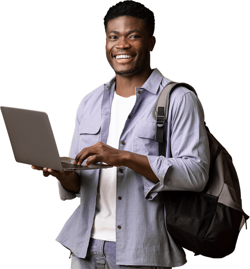 Happy young adult holding laptop.